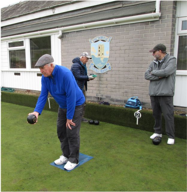 Tom about to deliver.